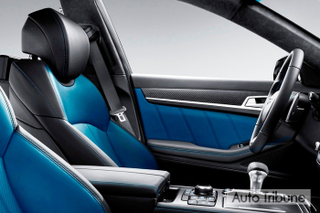 Illustration for article titled Genesis G80 Sport, The Blue Seated Carbon Fiber Trimmed Gold Stiched Steering Wheel Twin-Turbo Sedan All Three Of Us Have Been Waiting For...